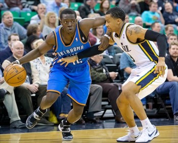 Reggie Jackson drives against Trey Burke. Jackson finished with 20 points, while Burke added 10 points for the Jazz.