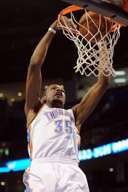Kevin Durant drops down the rim-rocker. Durant had a 28-point outing, which led all scorers to take the floor.